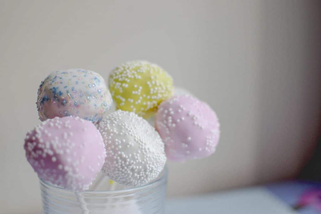 Once dipped, decorate your Easter cake pops with fun sprinkles