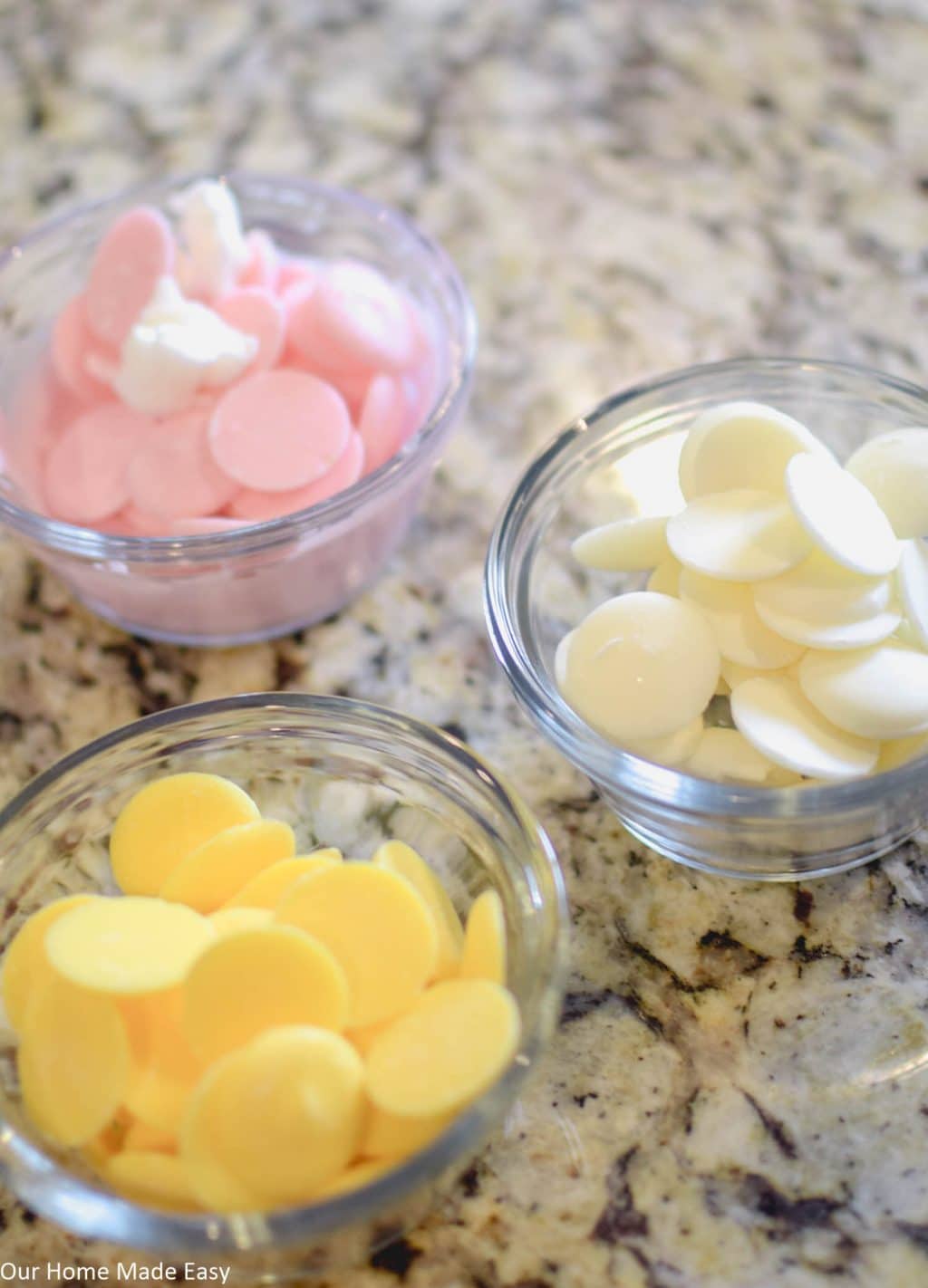 Melt your white chocolate candy melts with a little bit of coconut oil or crisco