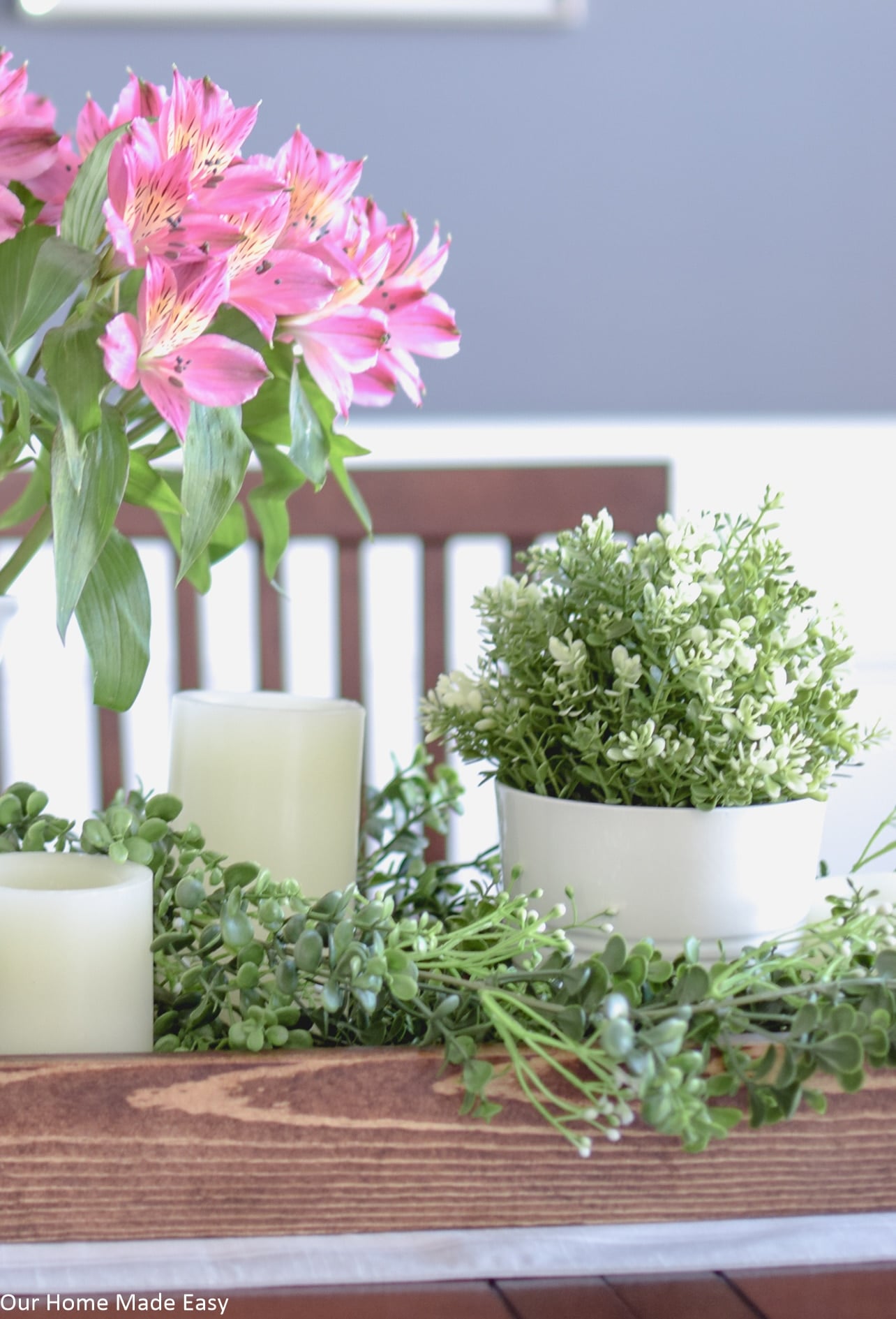 This easy Spring centerpiece is bright and colorful and brings a freshness to your home decor