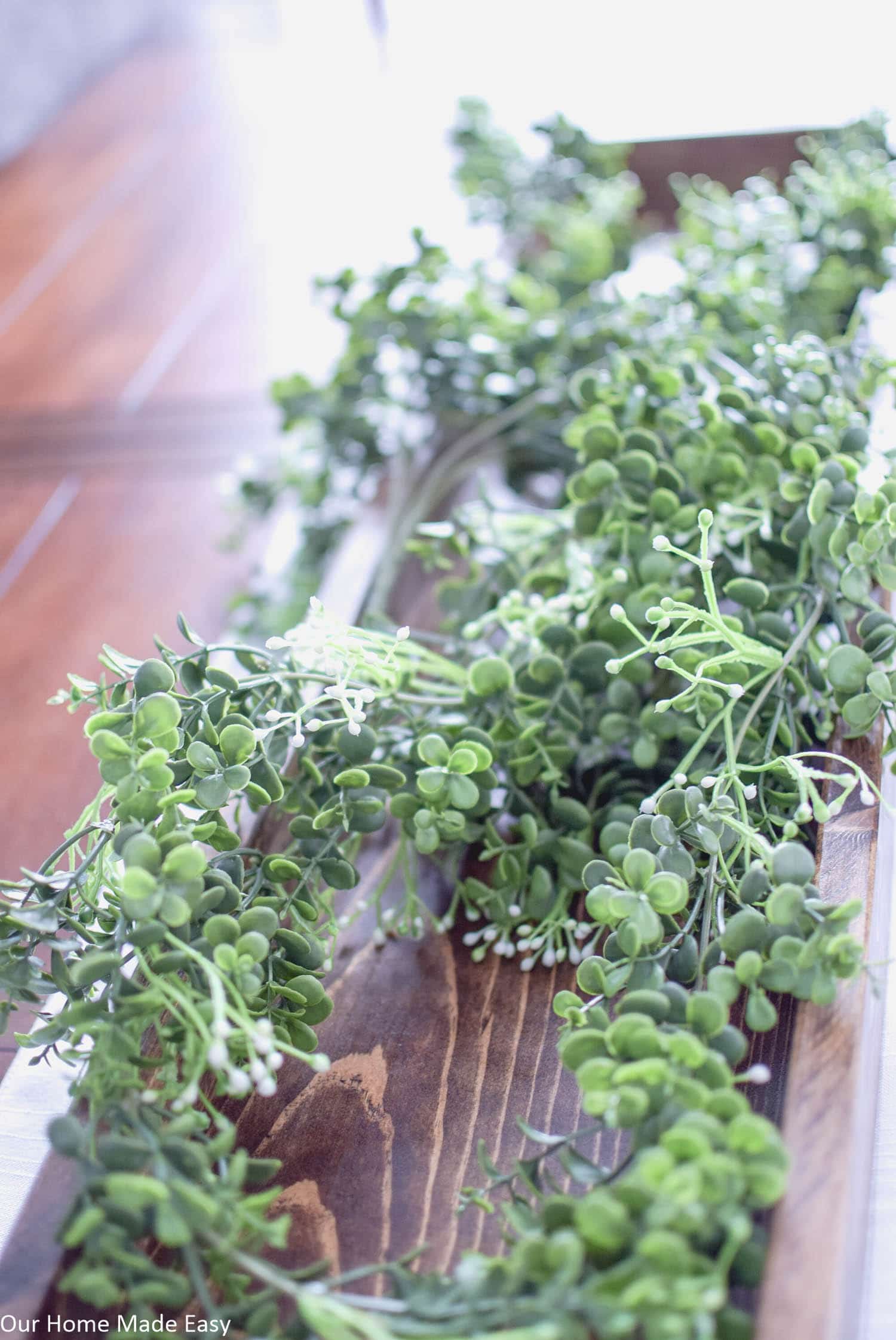 These faux green vines are perfect for a Spring centerpiece