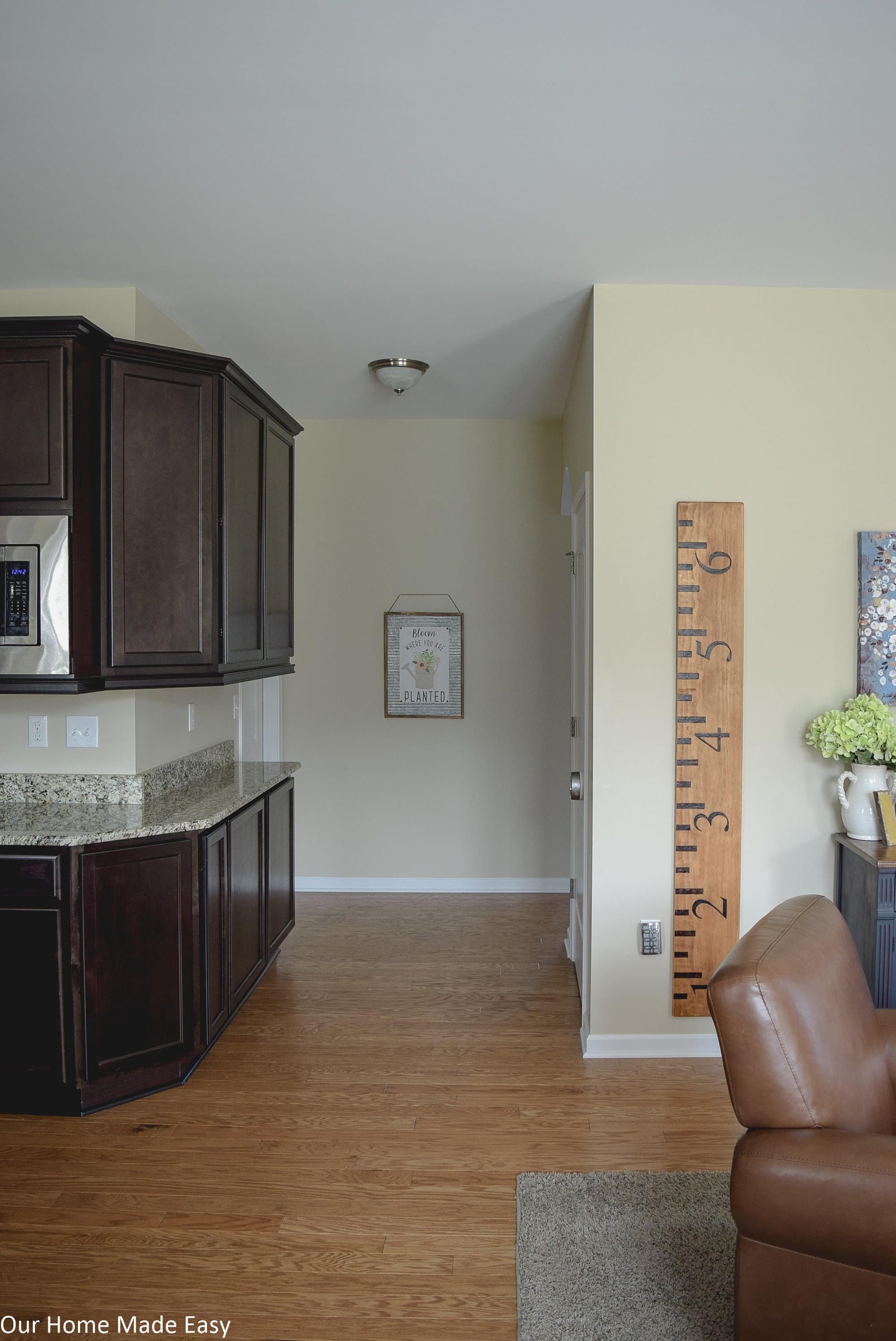 The neutral color scheme in our kitchen goes perfectly with the cabinets and hardwood floor throughout the house.