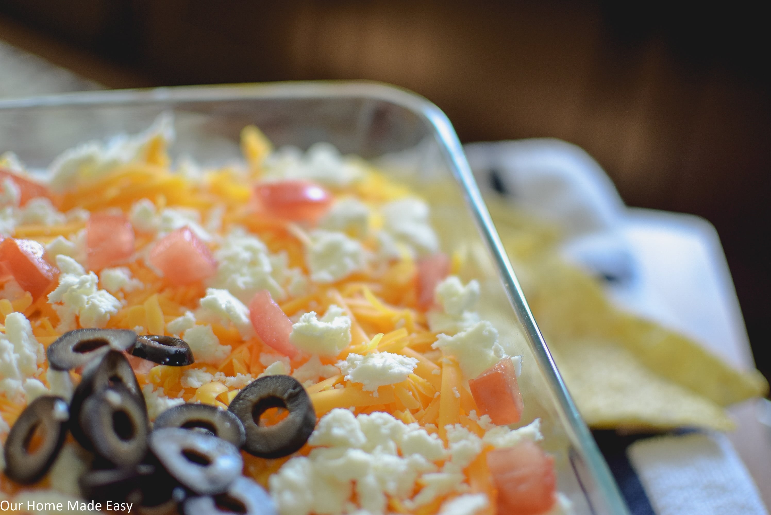 deliciously easy 7 layer taco dip is perfect for a party