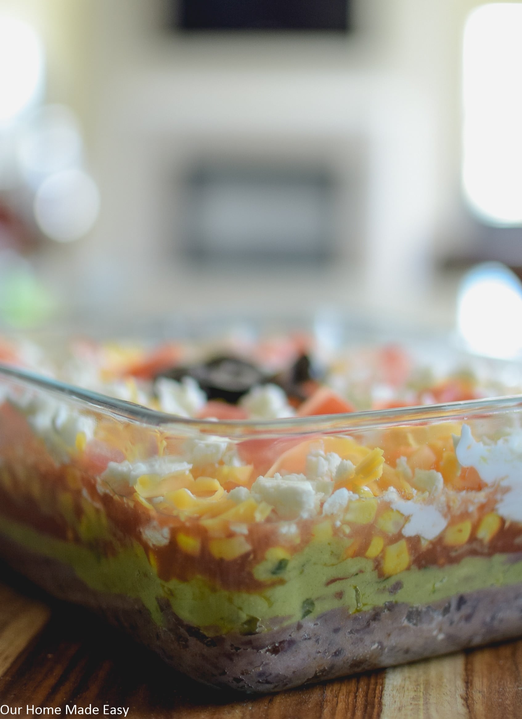 a quick 7 layer taco dip is a recipe that everyone should have on hand