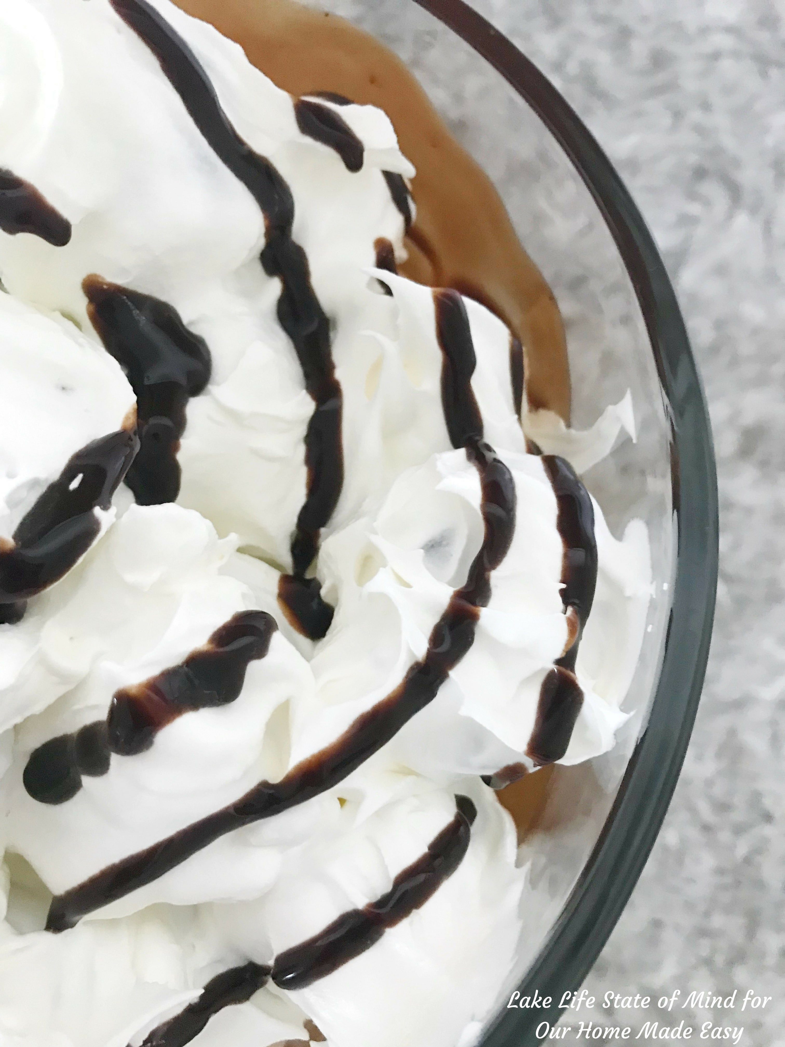 Decadent chocolate, light whipped cream, and sweet cream puffs make up this delicious dessert