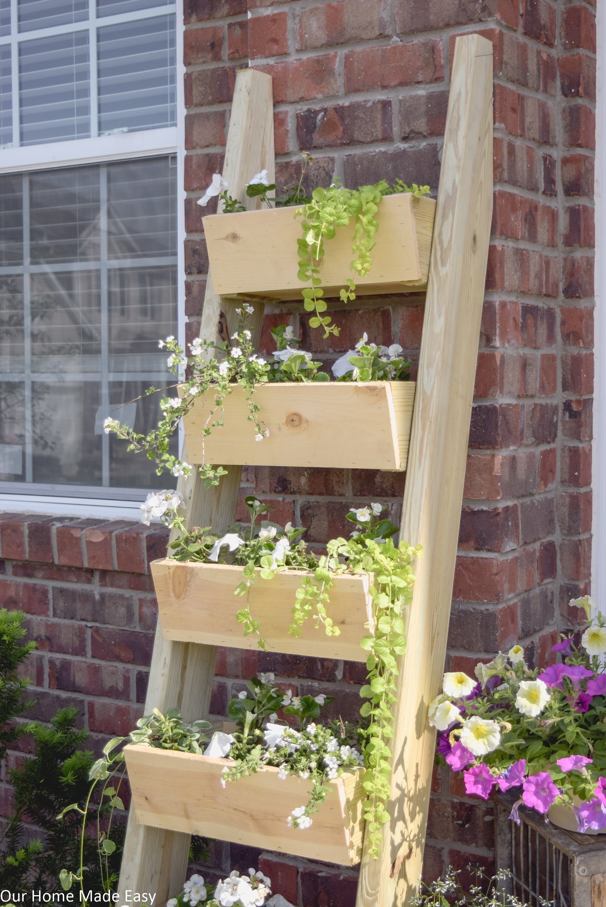This DIY cedar ladder planter is the perfect addition to your garden or outdoor home decor!