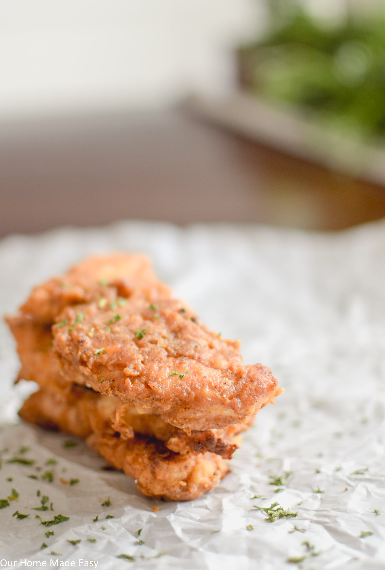 Tender and crispy oven baked chicken with all the savory flavors of fried chicken