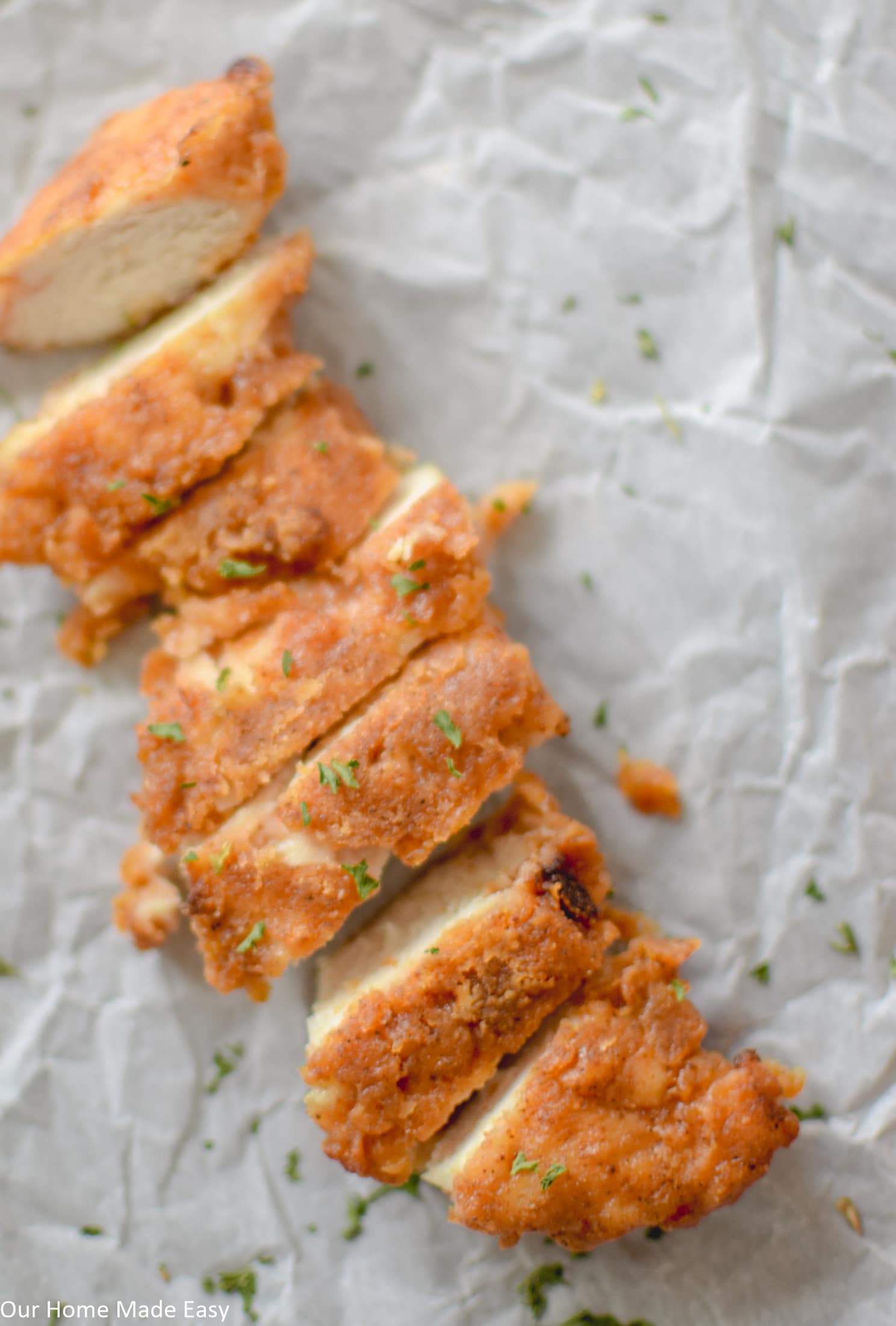 this easy oven baked chicken recipe has so many flavors and spices in the crispy breading