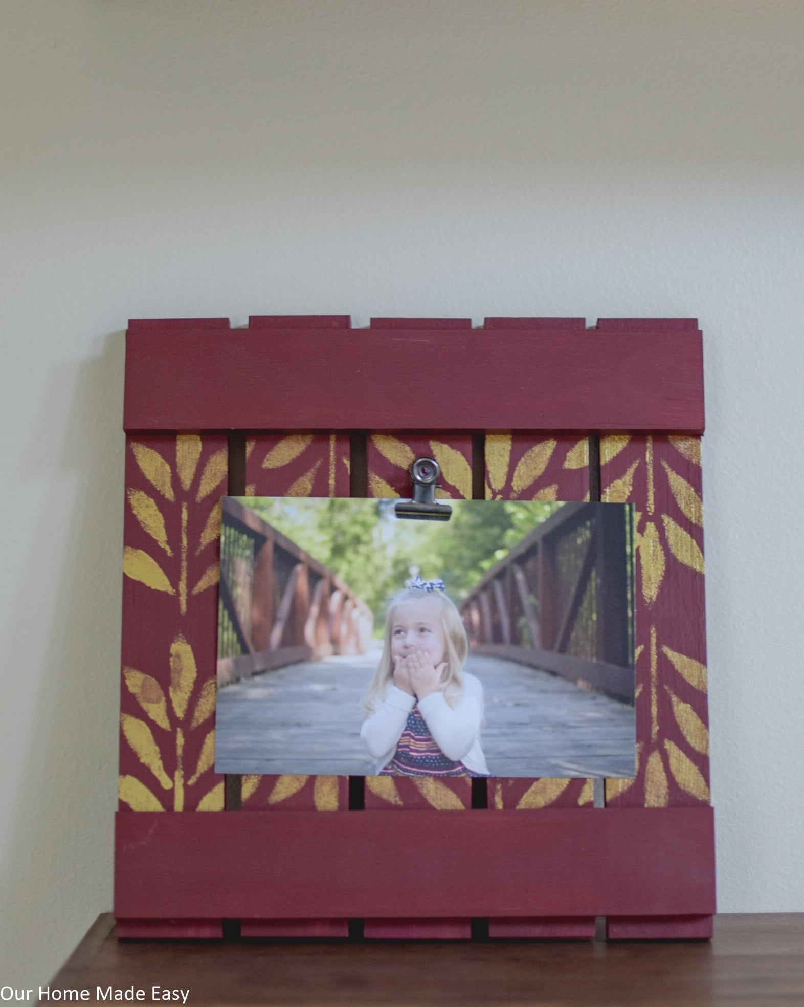This DIY wood picture frame would make a perfect gift