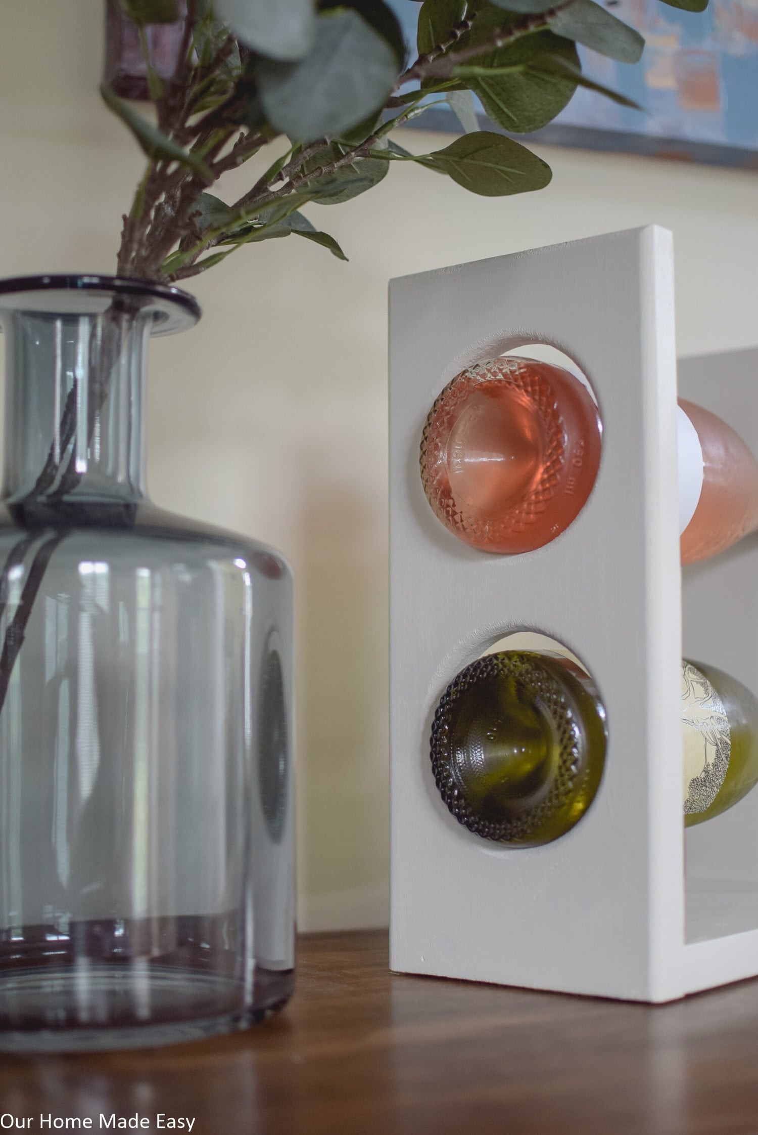 This DIY wine rack easily fits two average size bottles of wine