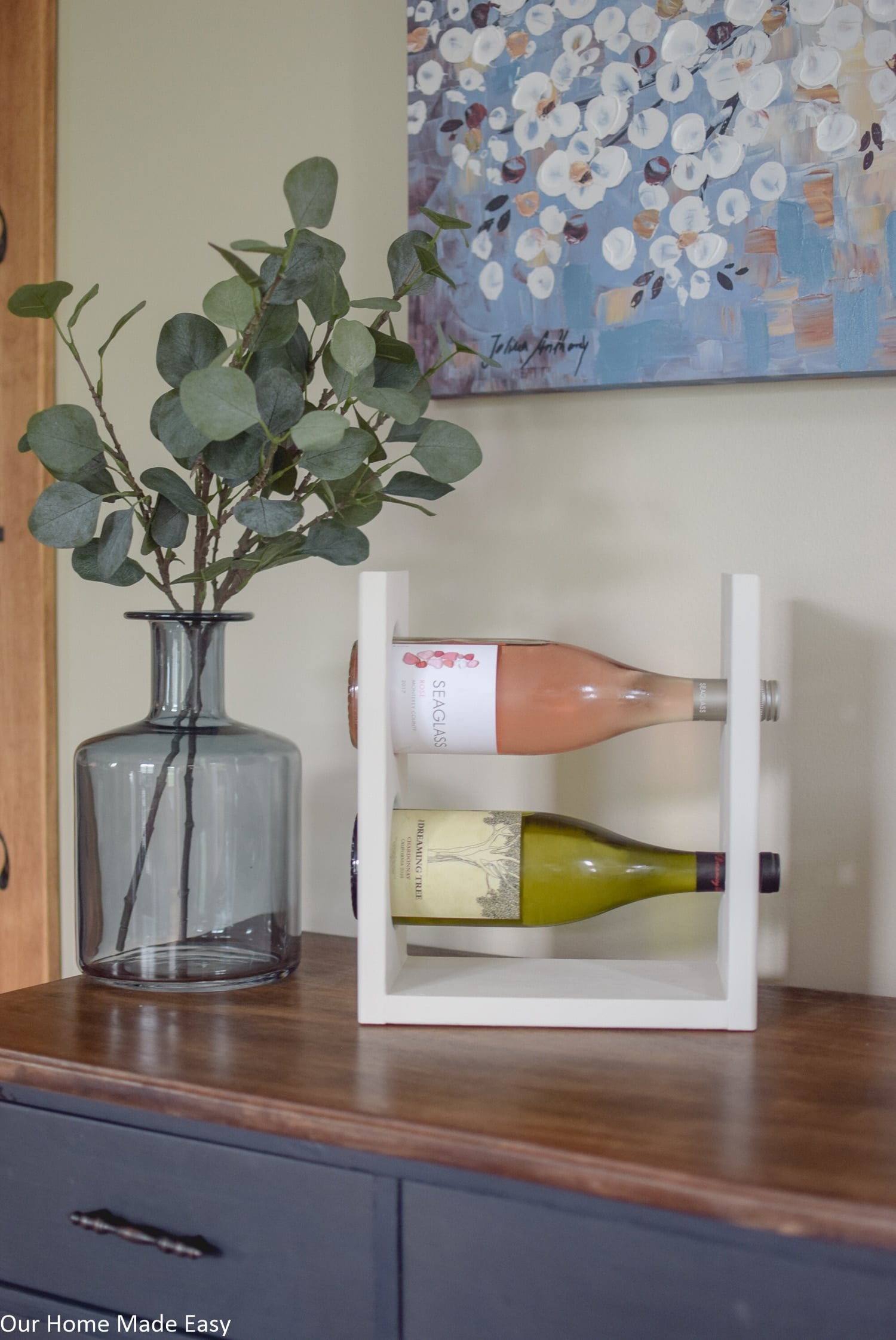 This simple DIY wine racks holds two average size bottles of wine - perfect for a couple's dinner