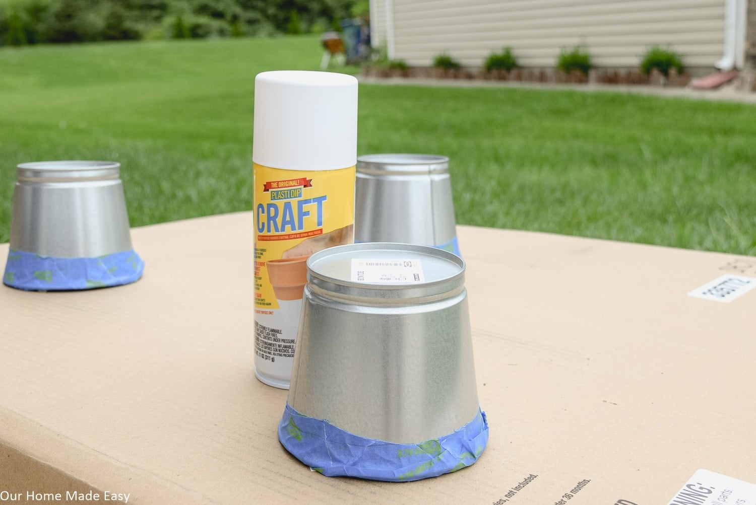 How it's time to use Plasti Dip spray paint to give these mental planters a paint-dipped effect