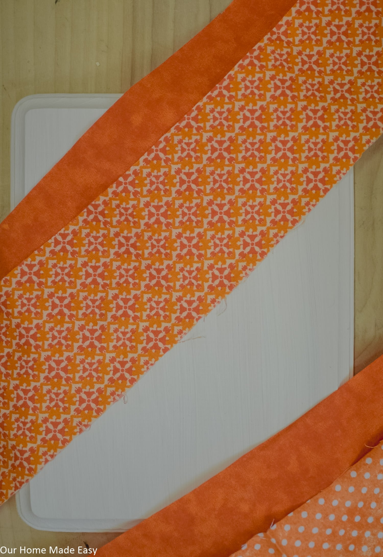 This simple fall fabric is perfect for making this fabric pumpkin craft