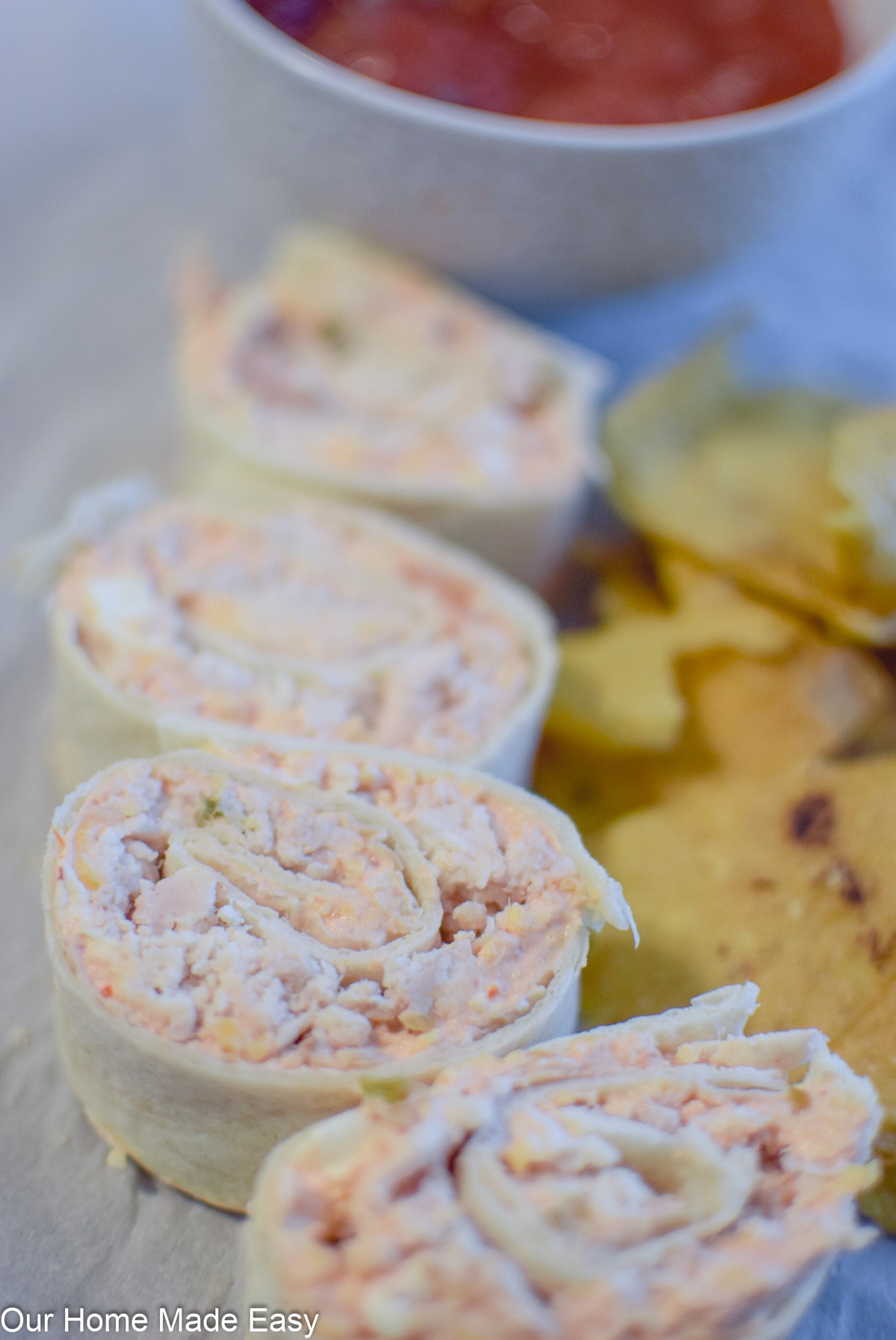 Make these easy chicken tortilla roll ups for a light lunch, after school snack, or easy dinner with a side of chips and veggies