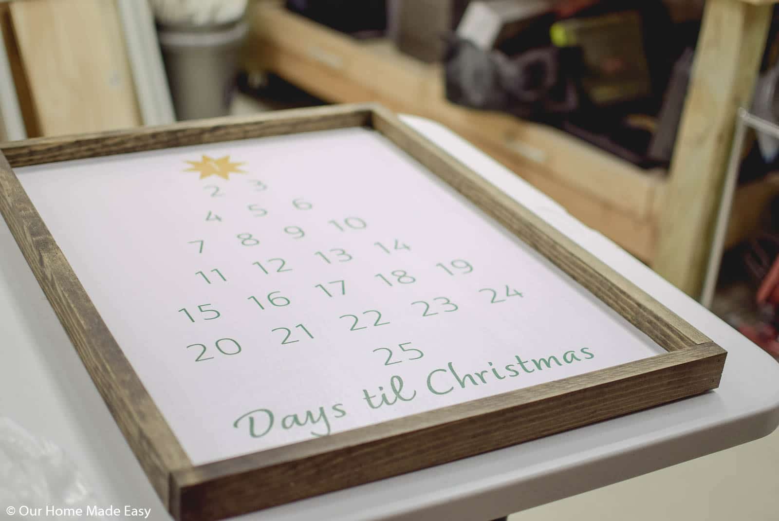 place the wood frame around the advent calendar