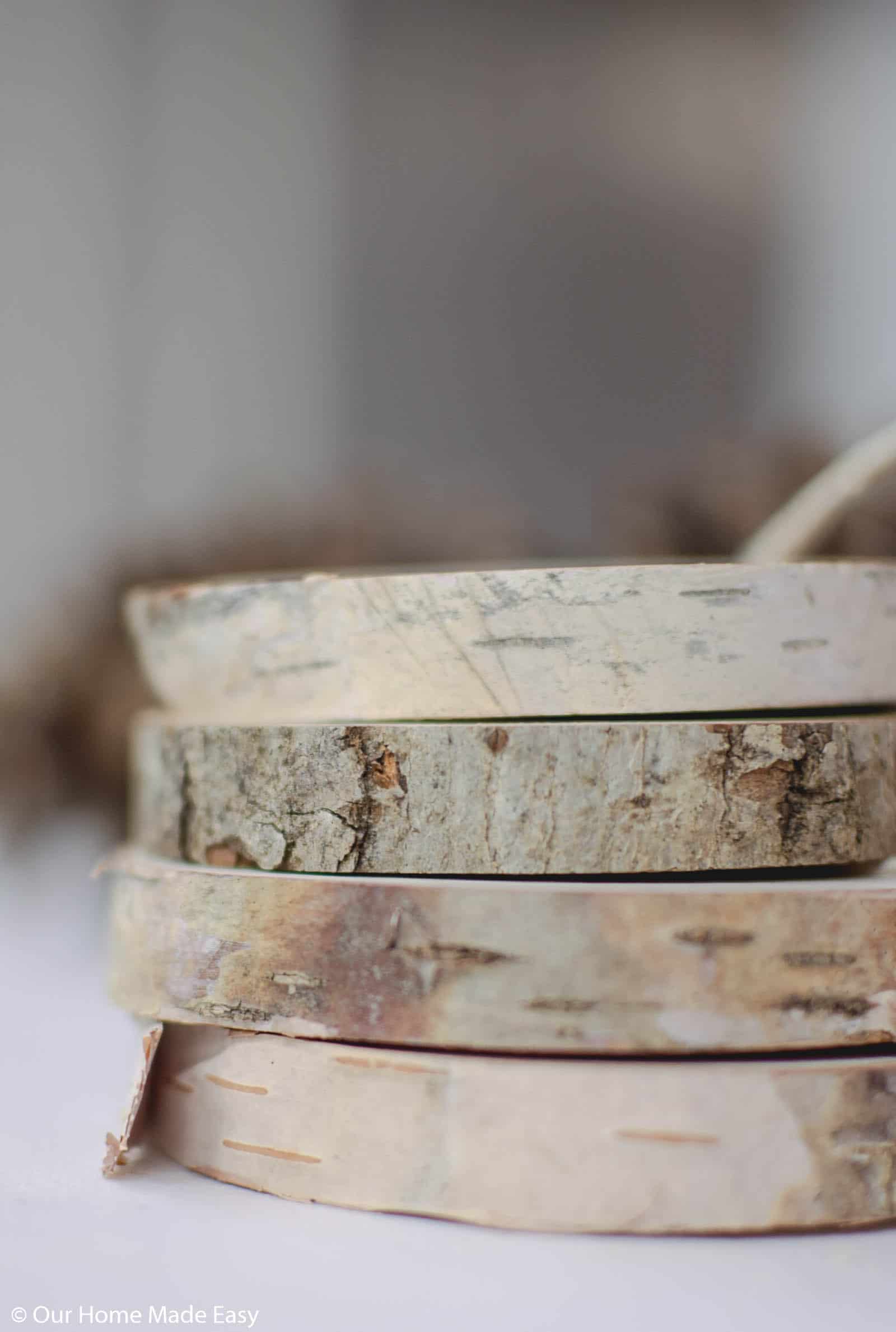 Use wood slices to make these rustic Christmas ornaments