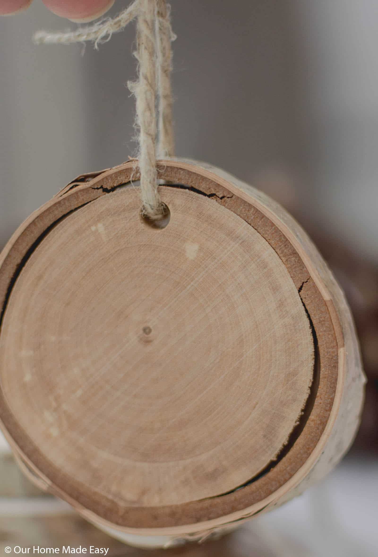 Buying pre-made wood slices makes this DIY wood slice ornament tutorial easy because you need no tools