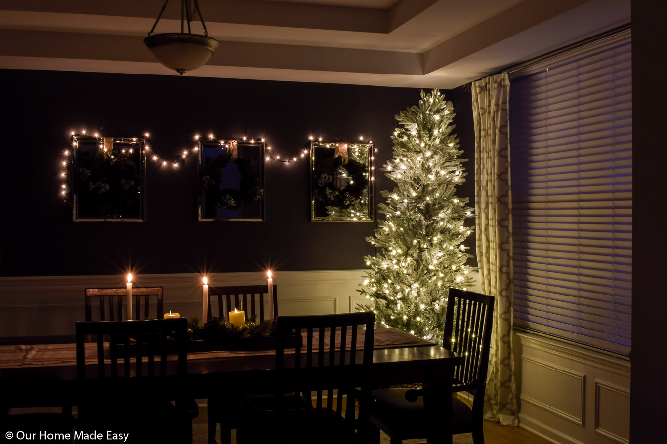 Our dining room Christmas tree is simple and bright, with clean white lights and no ornaments