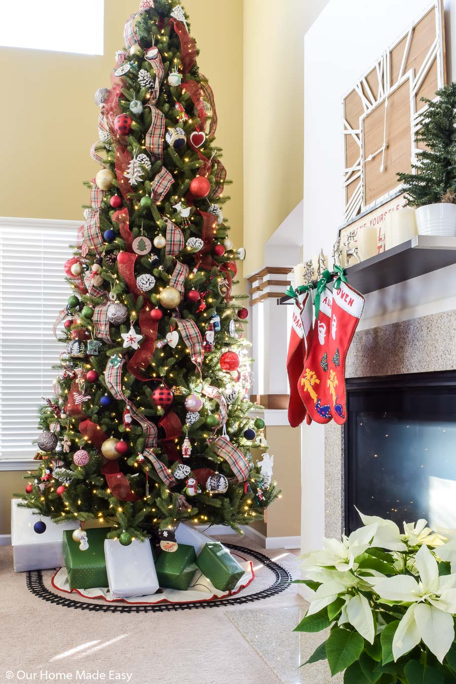 Decorate a Christmas tree with ribbon to add more fun, festive, and budget-friendly decorations to your tree