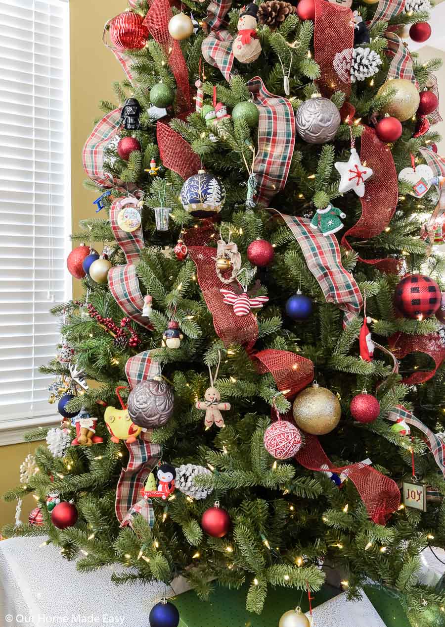 Use festive deco mesh ribbons to wrap around your tree for easy, budget-friendly decoration!