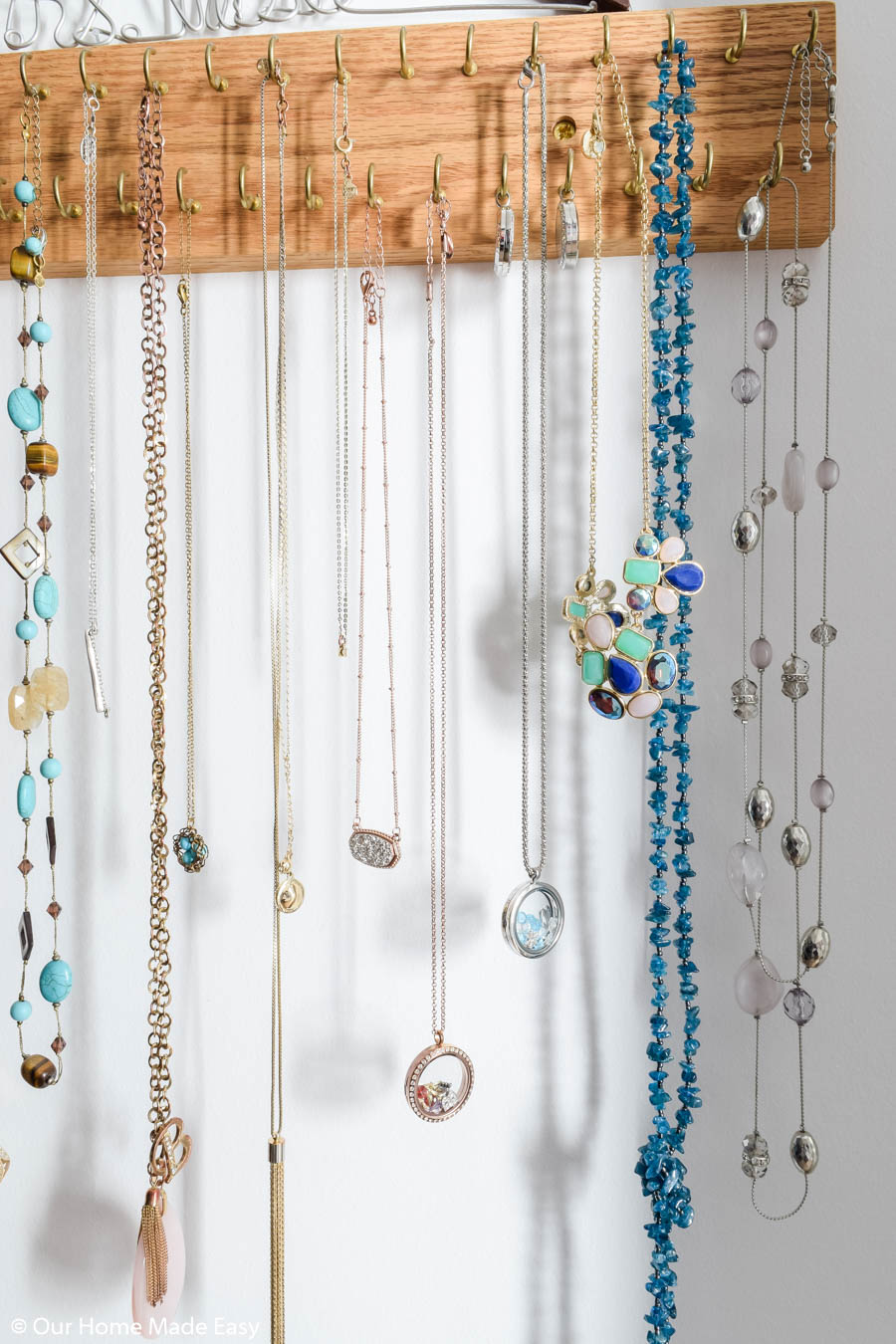 I decluttered my necklace collection and kept my favorite pieces, using this necklace rack to organize my jewelry