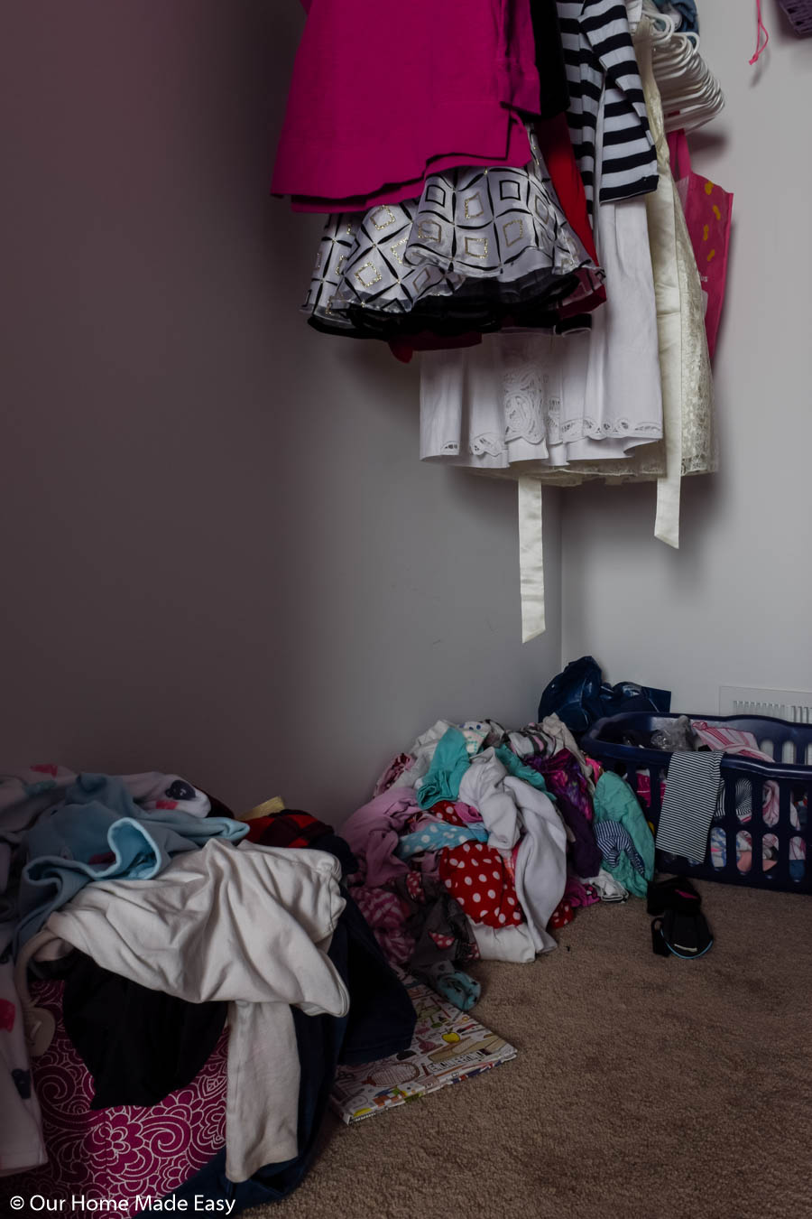 This small walk-in closet in our daughter's room lacked storage solutions and needed a makeover