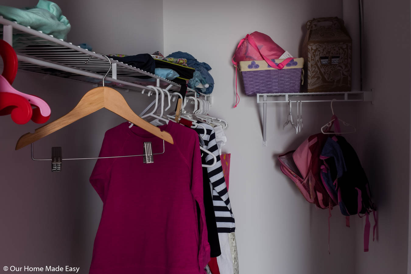 Our small walk-in closet had minimal storage and not enough space to really organize well