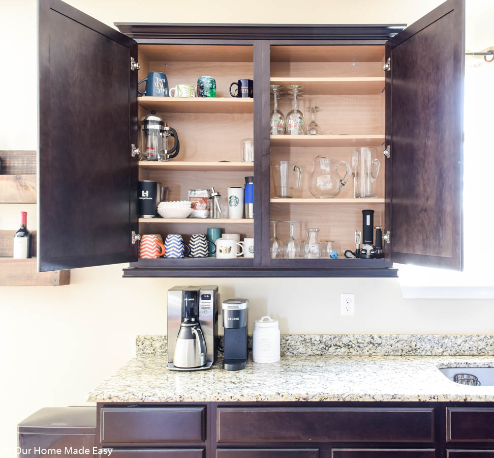 this cabinet organization is perfect for a drinking station