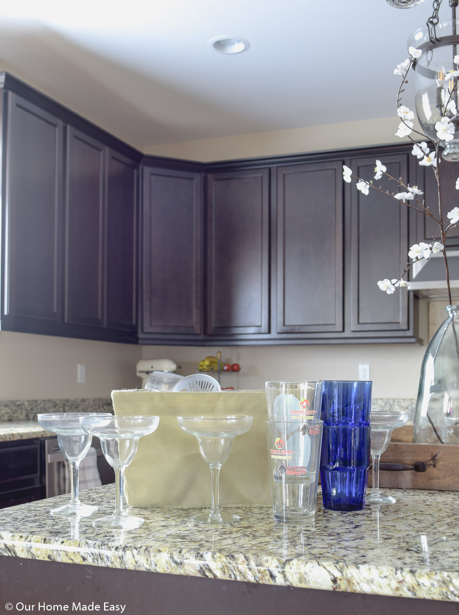 start your cabinet organizing by working through your collection of drinking glasses