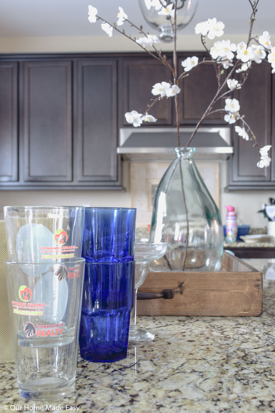 have too many glasses cluttering your cabinets? Here's how to organize your kitchen cabinets better