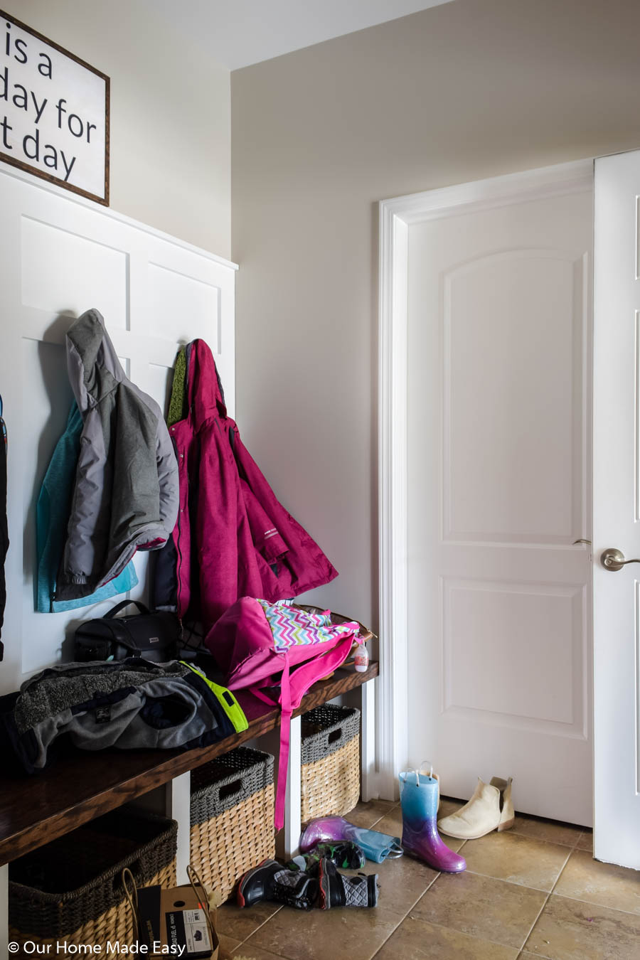 The first step to organizing your mudroom is to declutter--keep only what you need in there