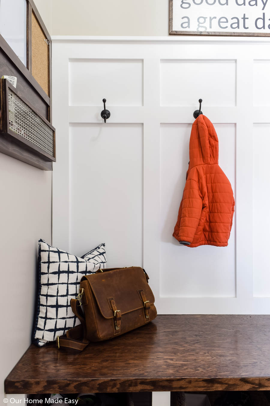 a family command center is most useful when it's right in the entry way, where everyone comes and goes