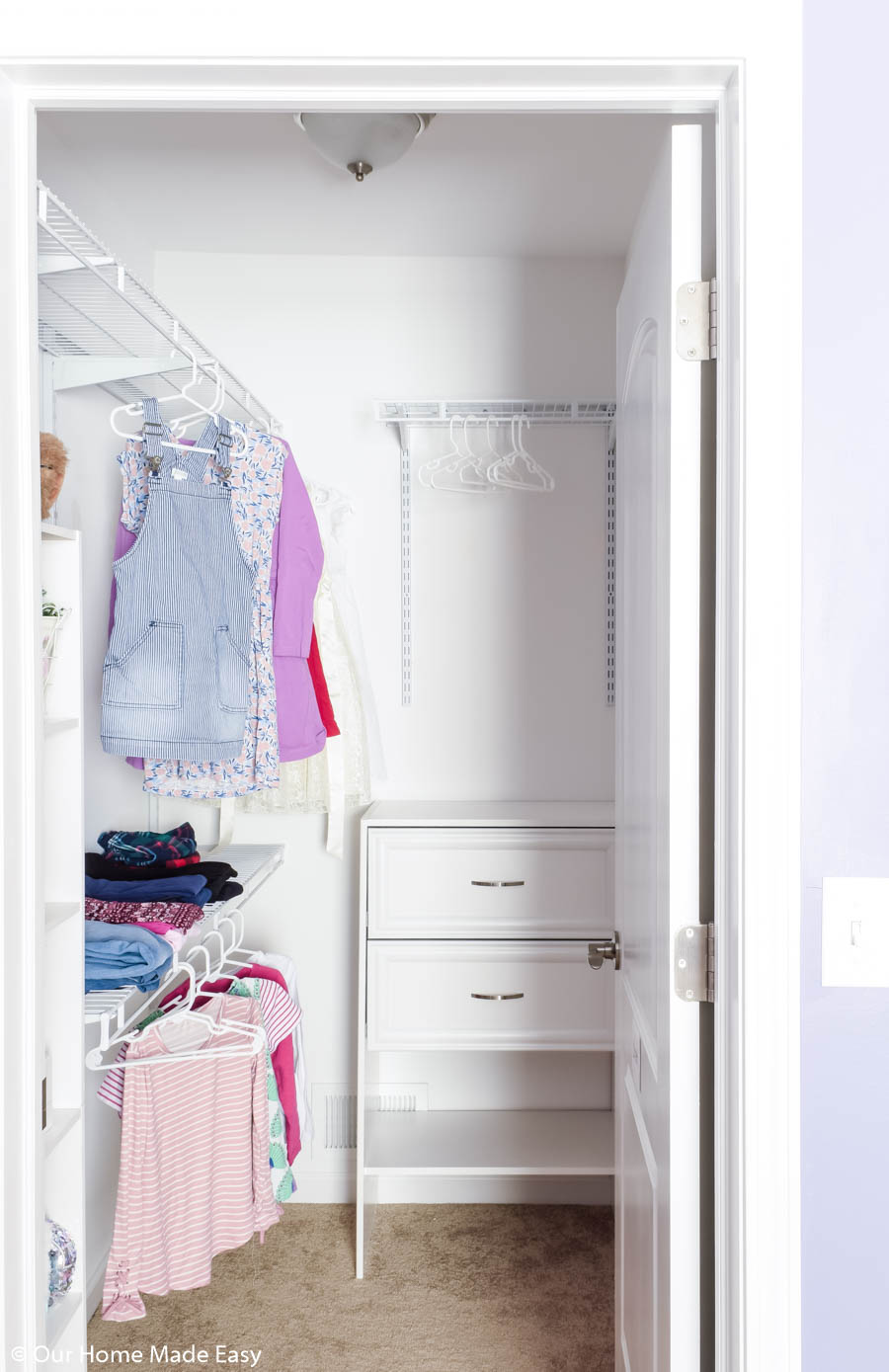 The key to small closet organization is plenty of storage