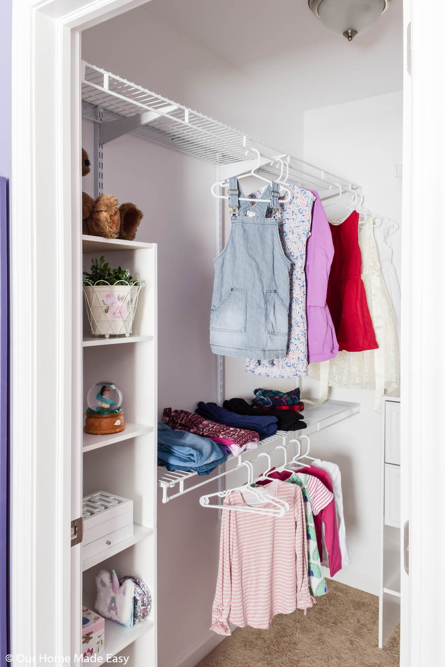 To organize our small closet, we added new shelving and storage, making the best use of small space