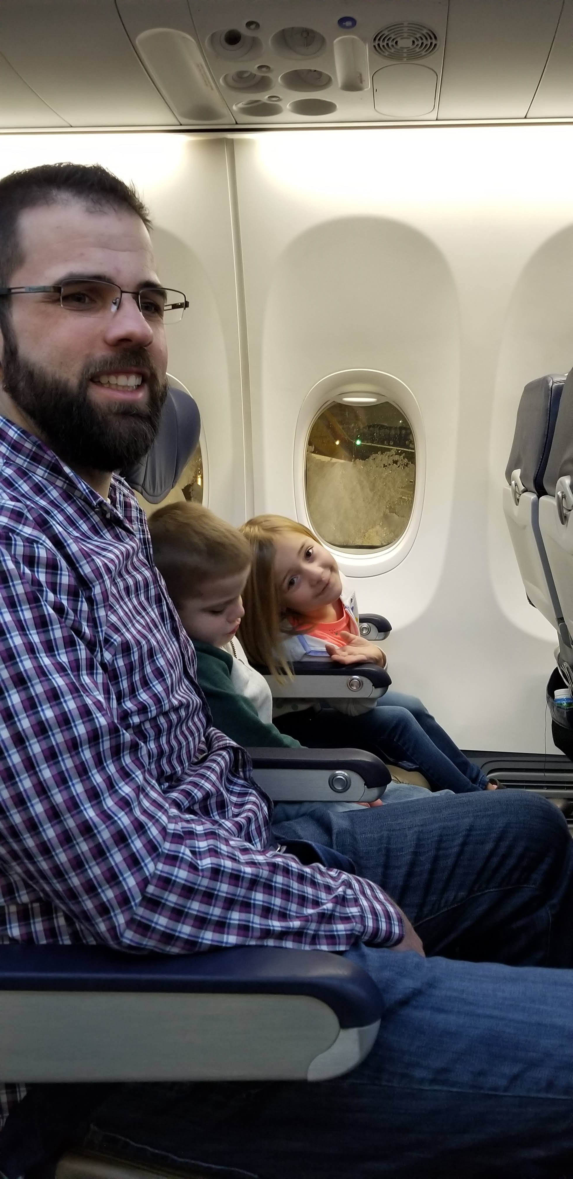 Jordan and the kids are ready for takeoff as we fly to Arizona