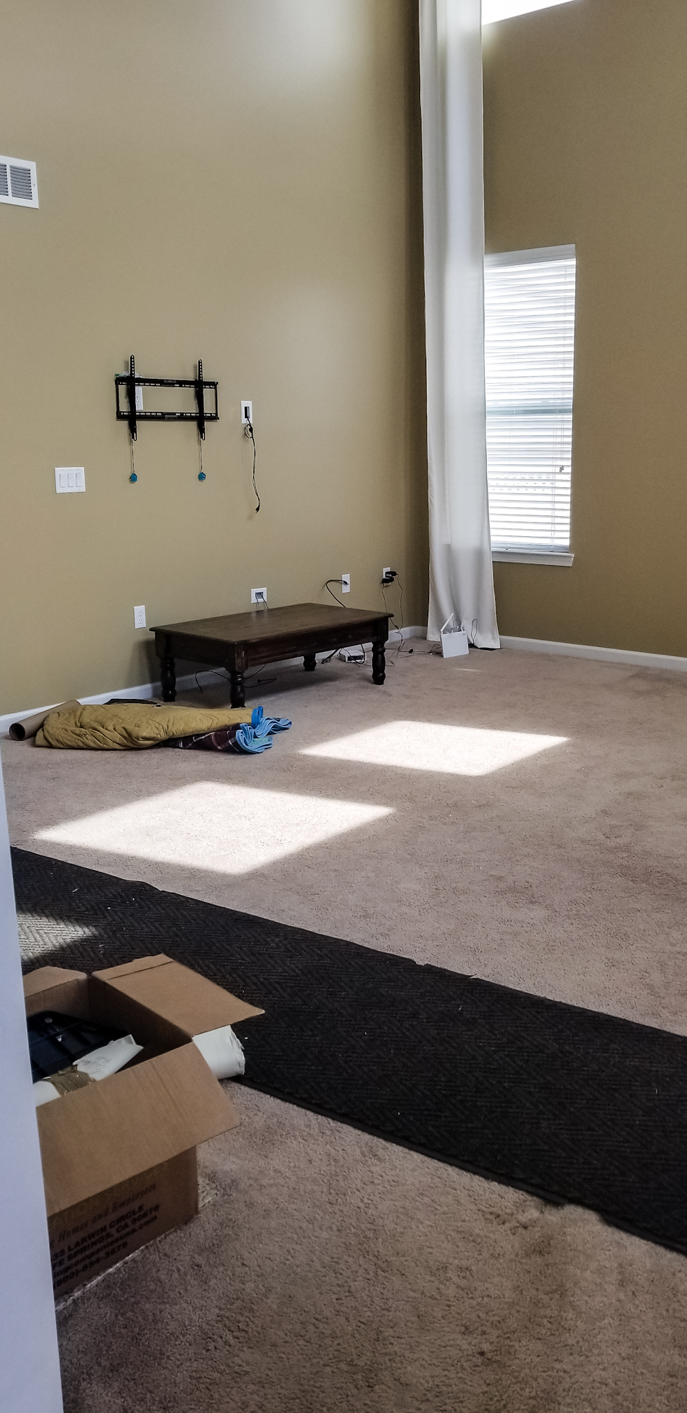 An empty living room as we pack up and get ready to leave our Michigan home