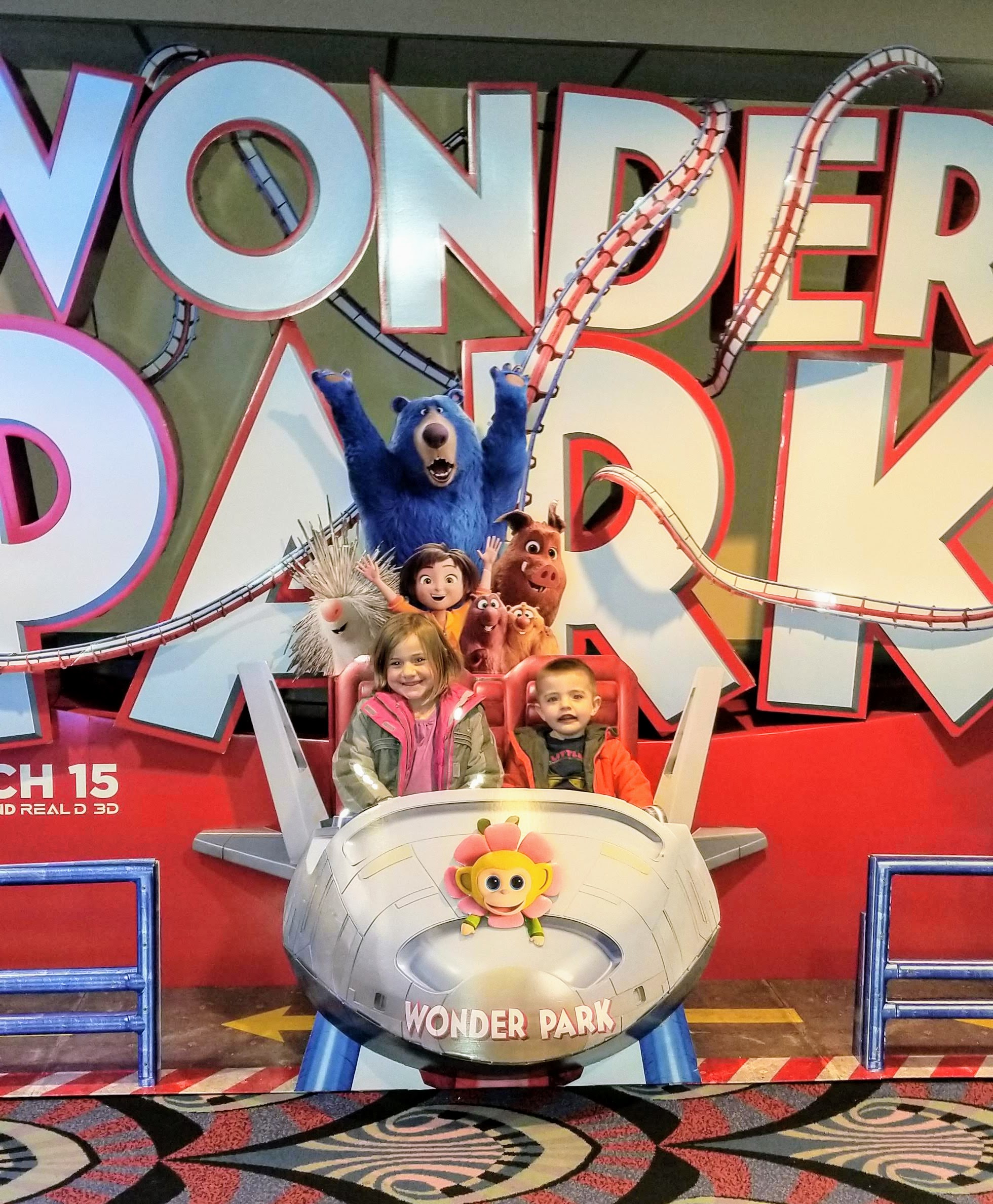 The kids enjoying all the fun at movie ads at the movie therater