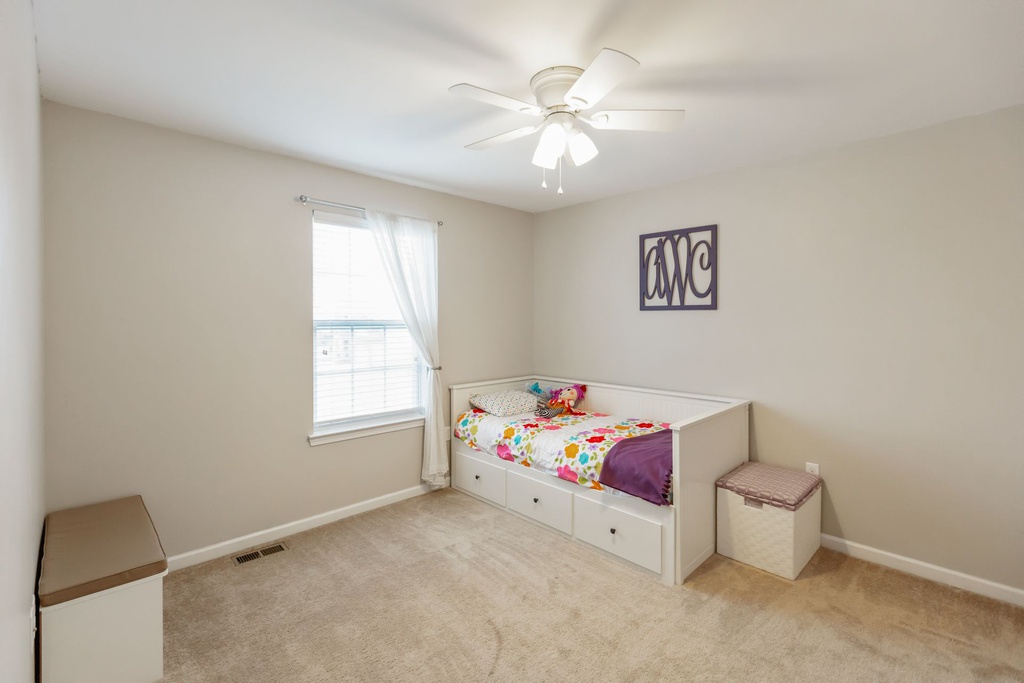 We repainted the purple room to be a more neutral color, making it more appealing to buyers