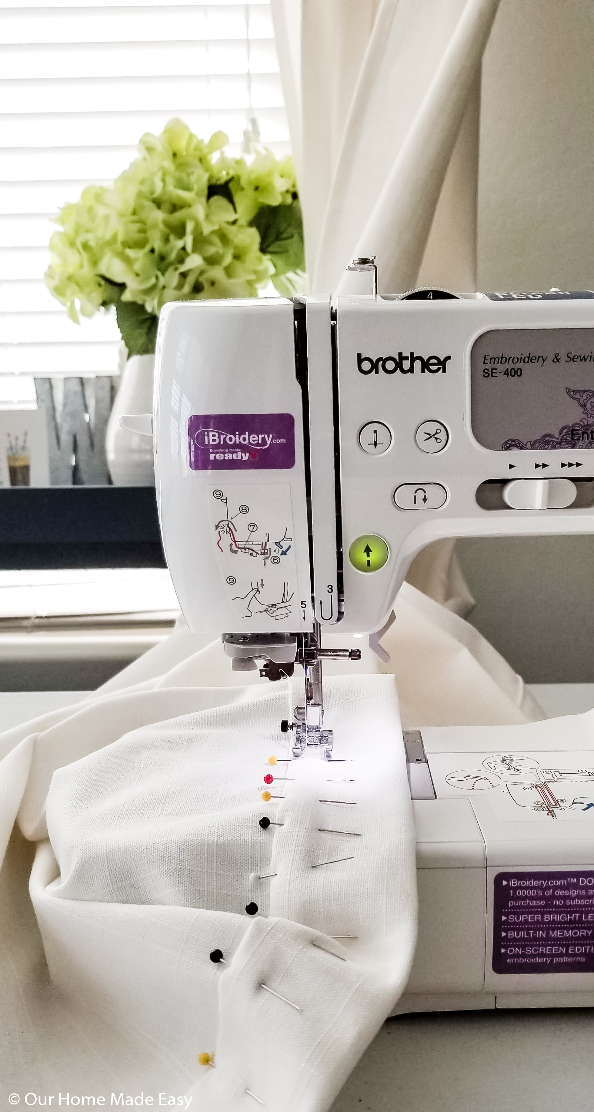 Bust out your sewing machine to hem your DIY curtains to your preferred length