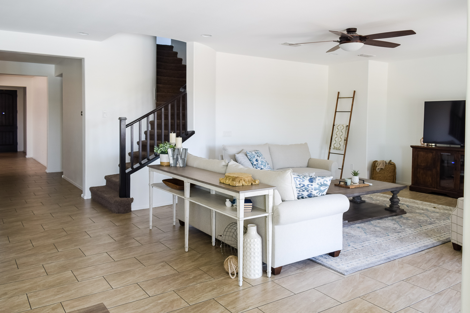 We painted our living room a nice bright white to brighten up the space