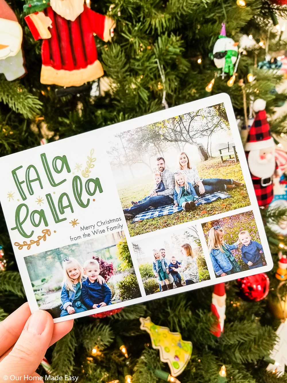 Family Christmas card in front of Christmas tree