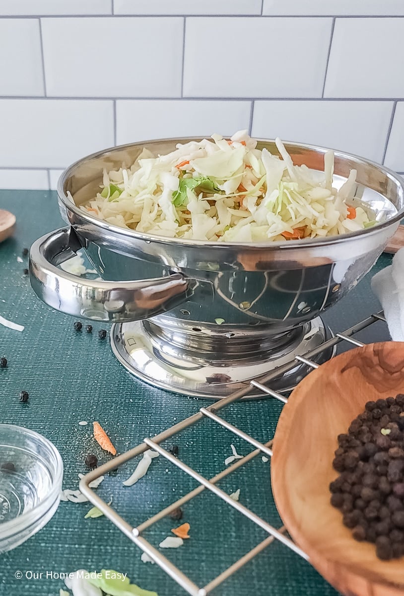 Coleslaw mix in metal colander
