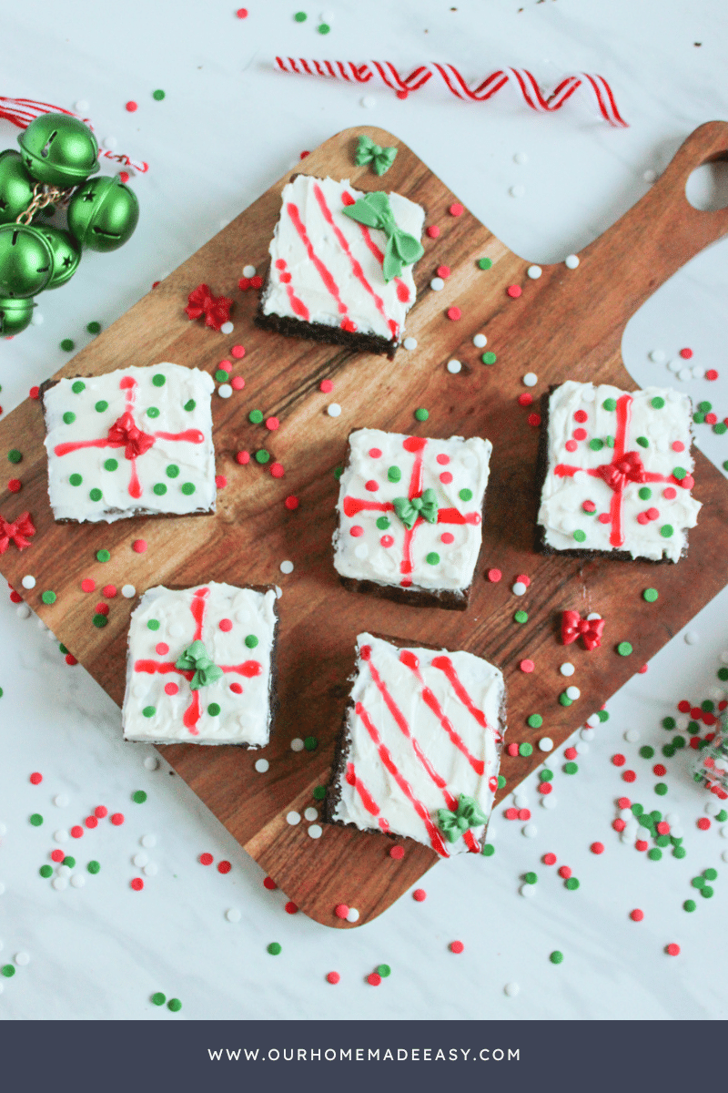Easy Christmas Brownies Presents Decorated on cutting board