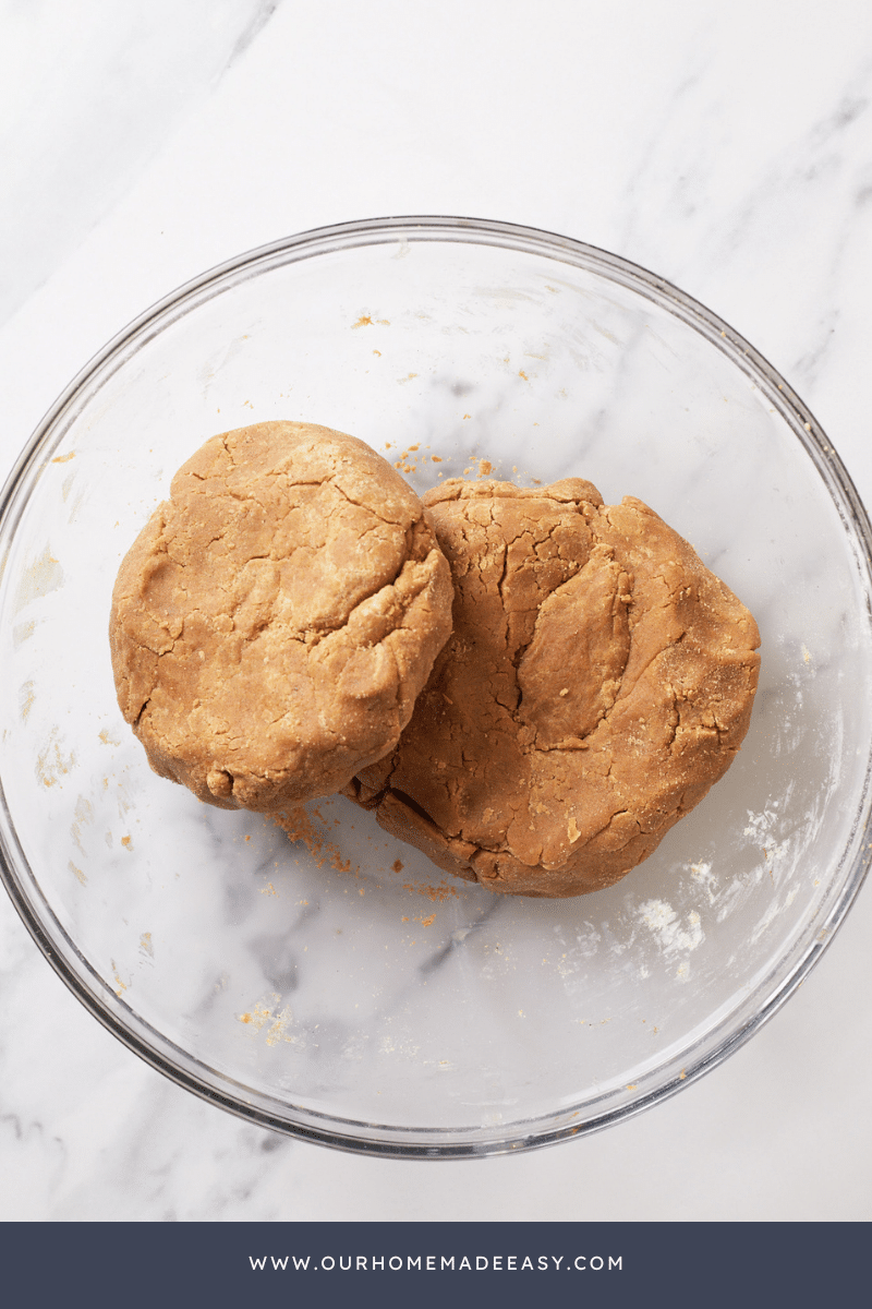 gingerbread cookie dough disks in medium bowl