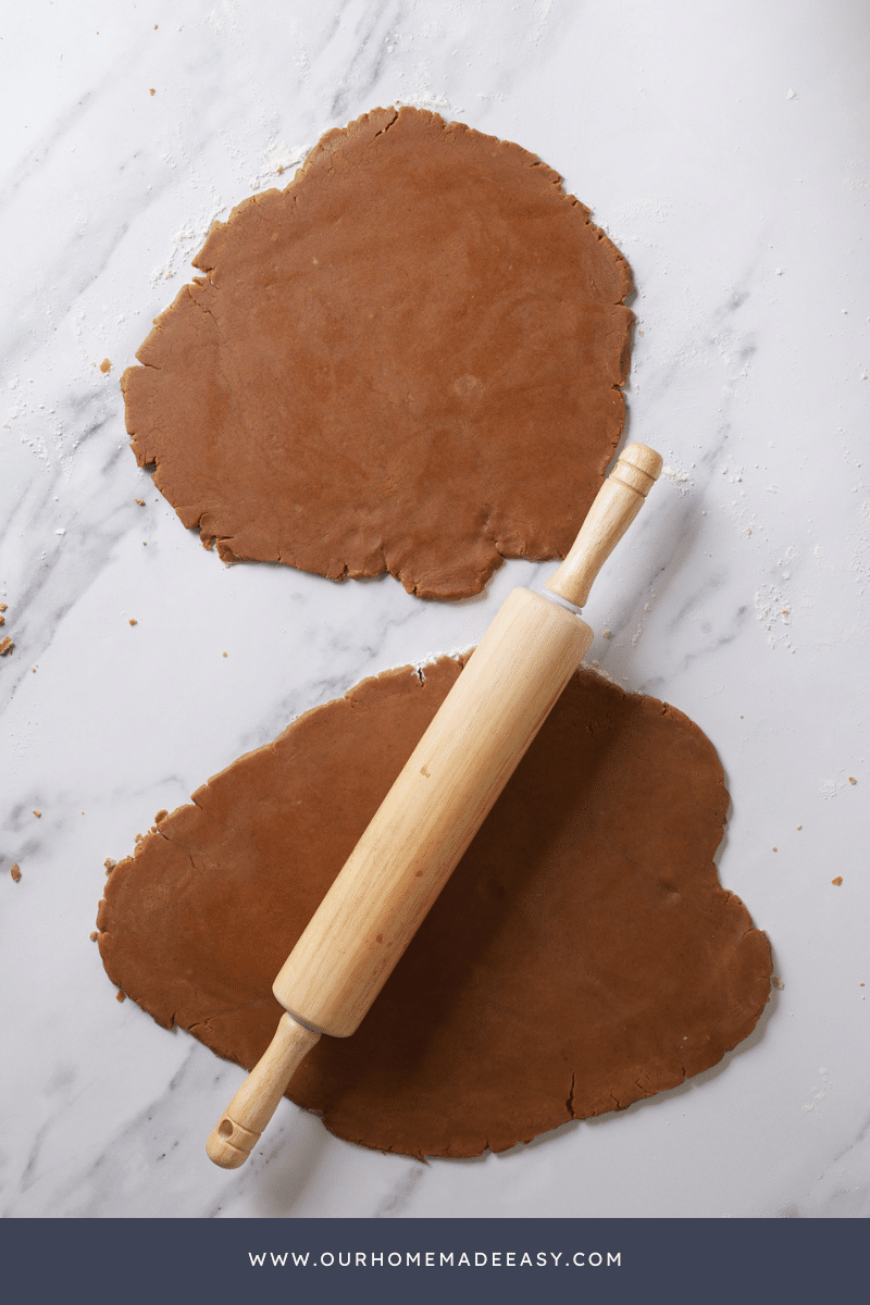 Gingerbread Cookie Dough rolled out with rolling pin
