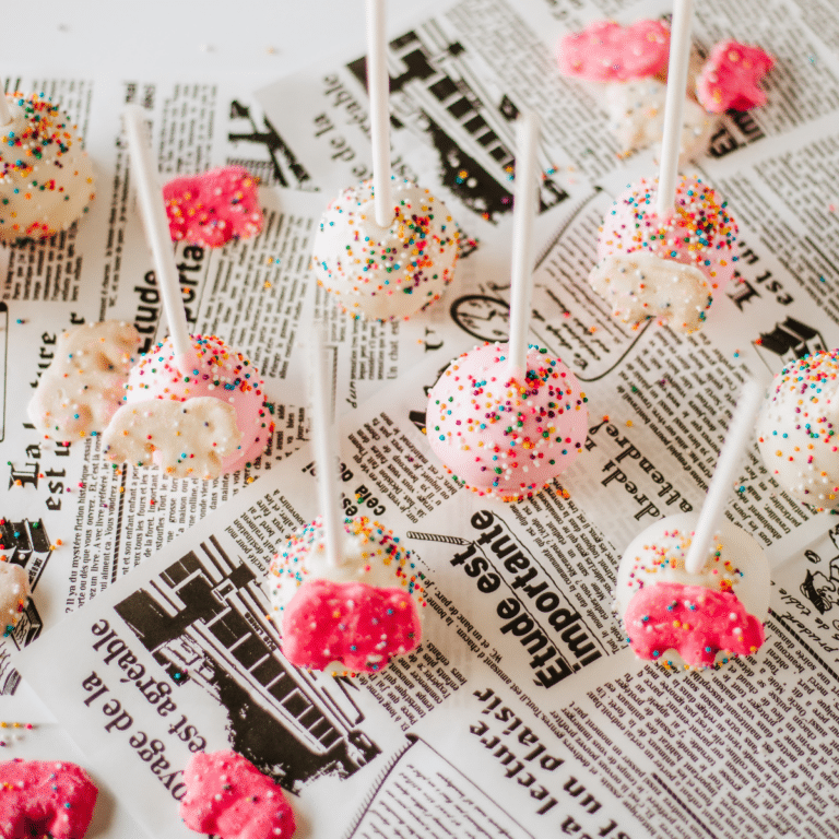 Frosted Animal Cookies cake pops on table