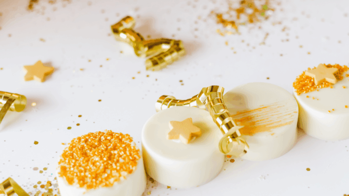 white chocolate dipped oreos on table