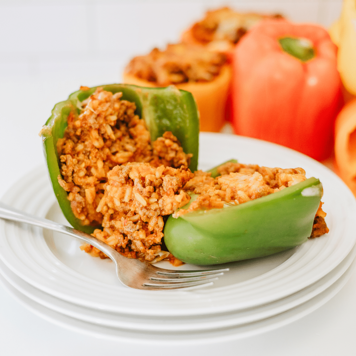 Air Fryer Stuffed Peppers cut open on plate