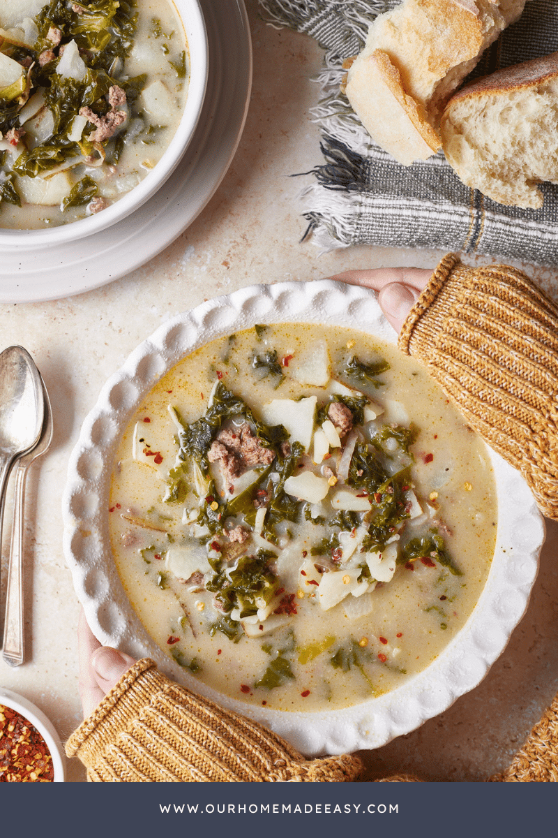 Healthy zuppa toscana soup with hands