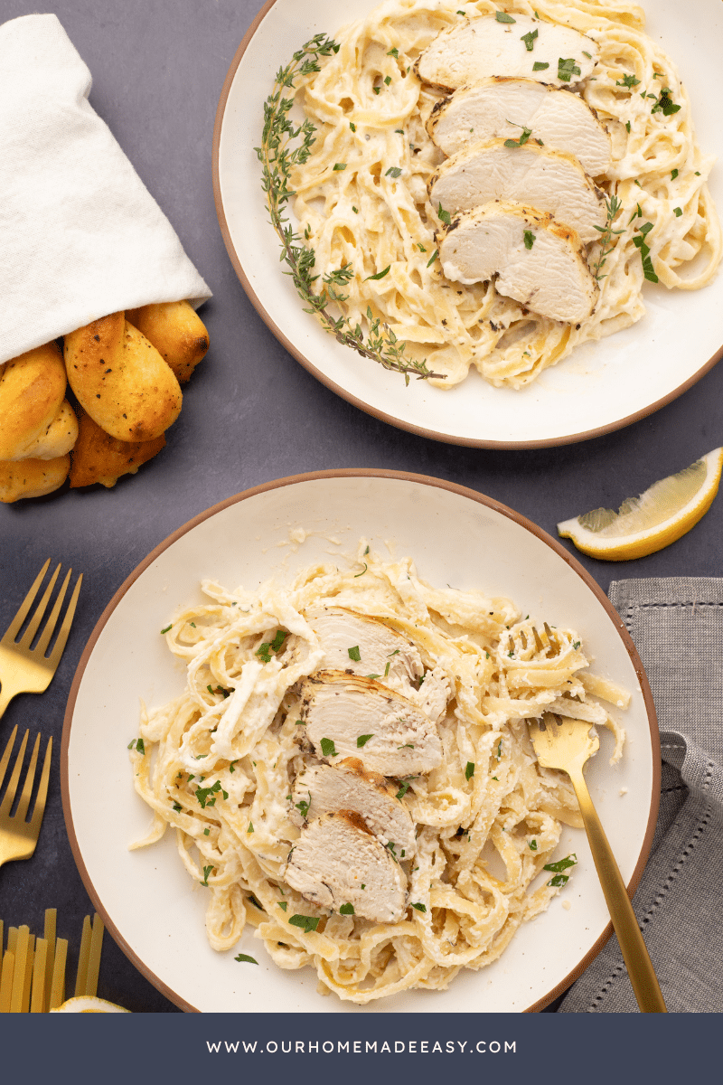 breadsticks on counter with pasta dish