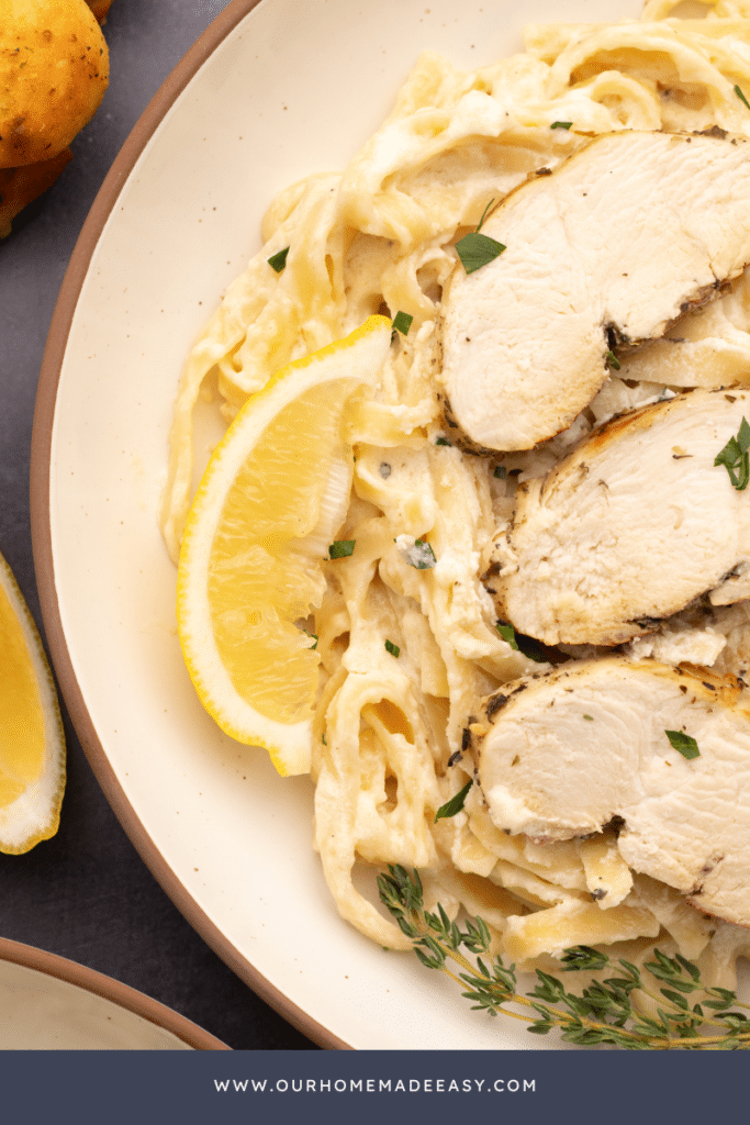 close up of chicken fettuccine on plate
